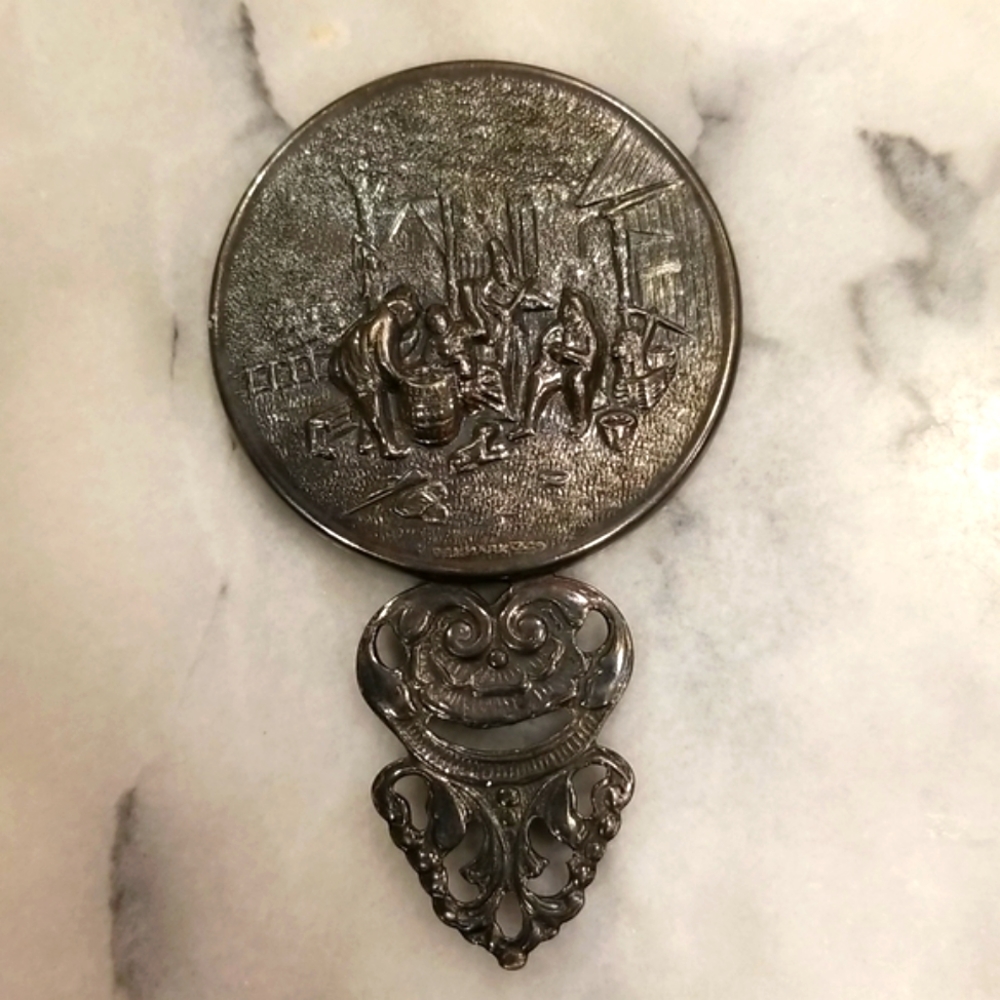 Vintage Hans Jensen silver repousse purse/hand mirror with filigree handle